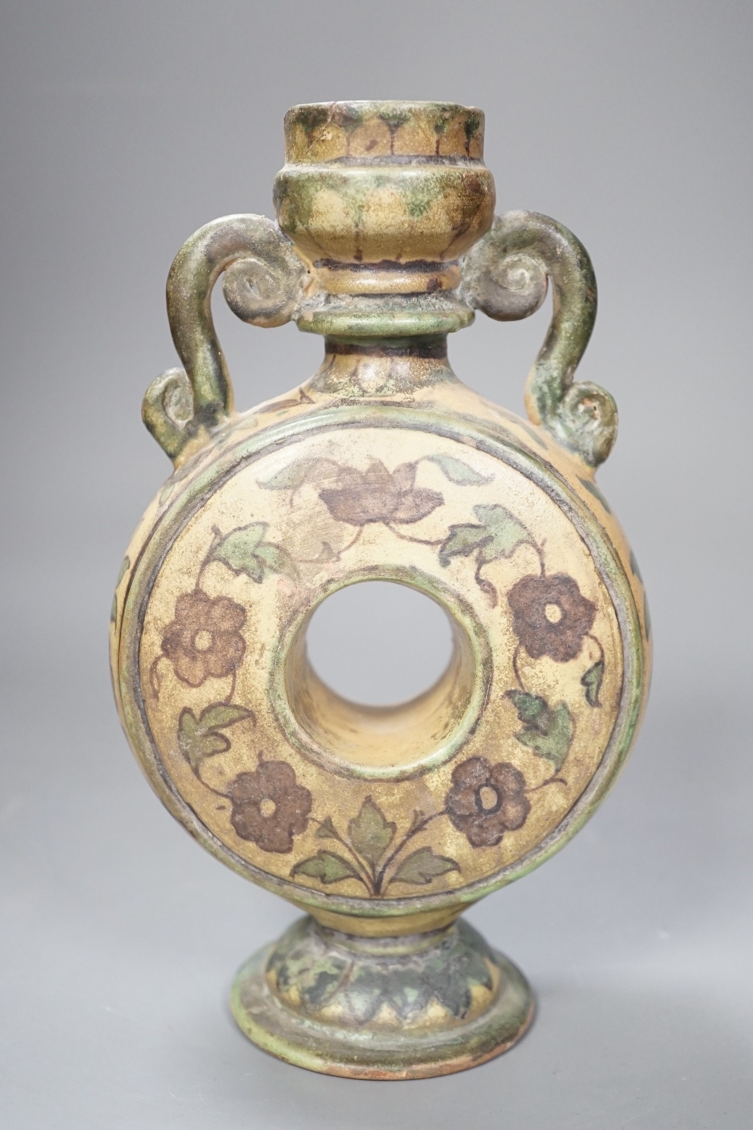 A polychrome painted terracotta vase, 20cm